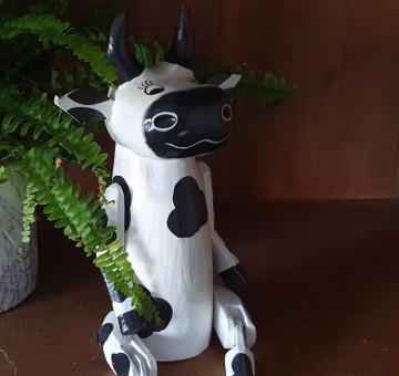 hand carved shelf puppet cow