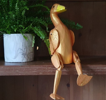 hand carved shelf puppet golden goose