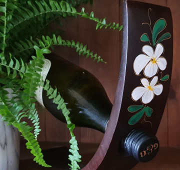 hand carved curved wine bottle holder white flower