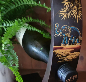 hand carved curved wine bottle holder blue elephant
