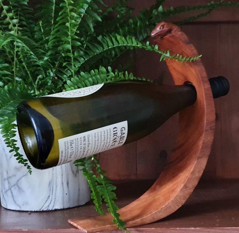 hand carved curved wine bottle holder lizard design