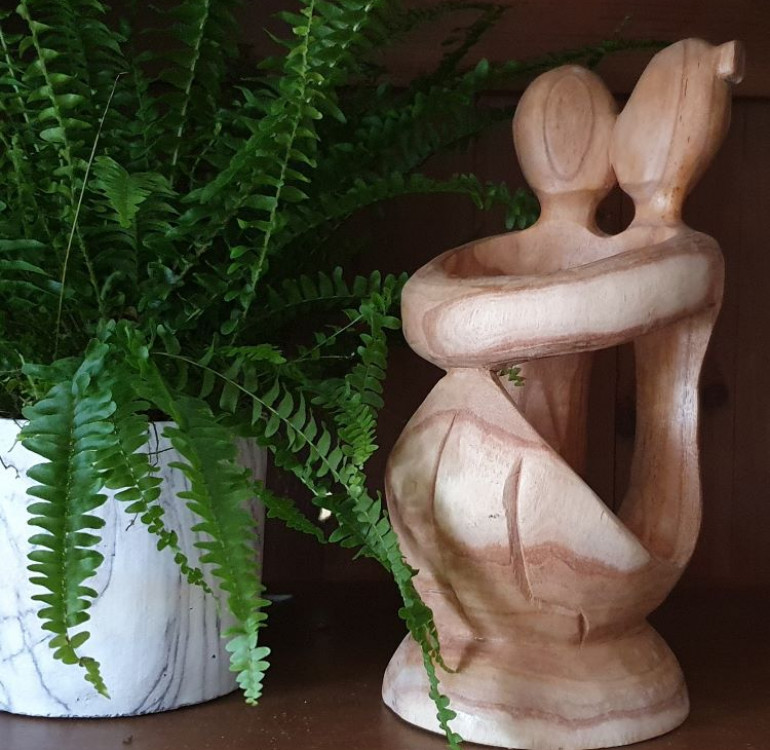 hand carved suar wood kissing couple wine bottle holder