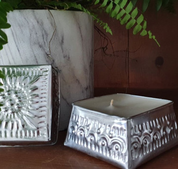 Embossed tin candle