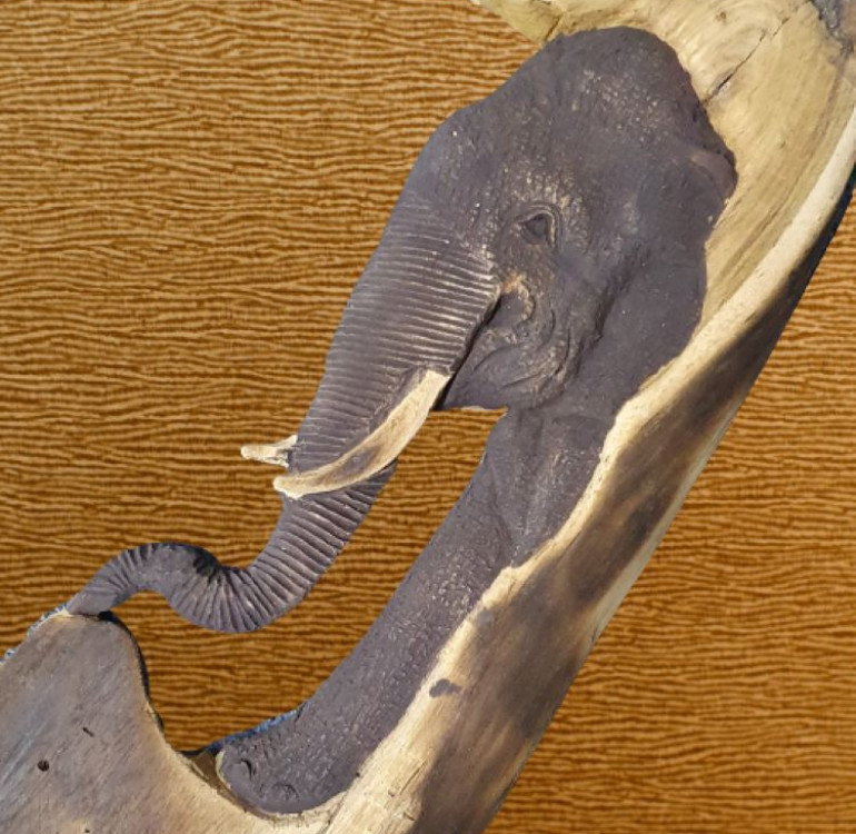 Hand carved elephant wall hanging