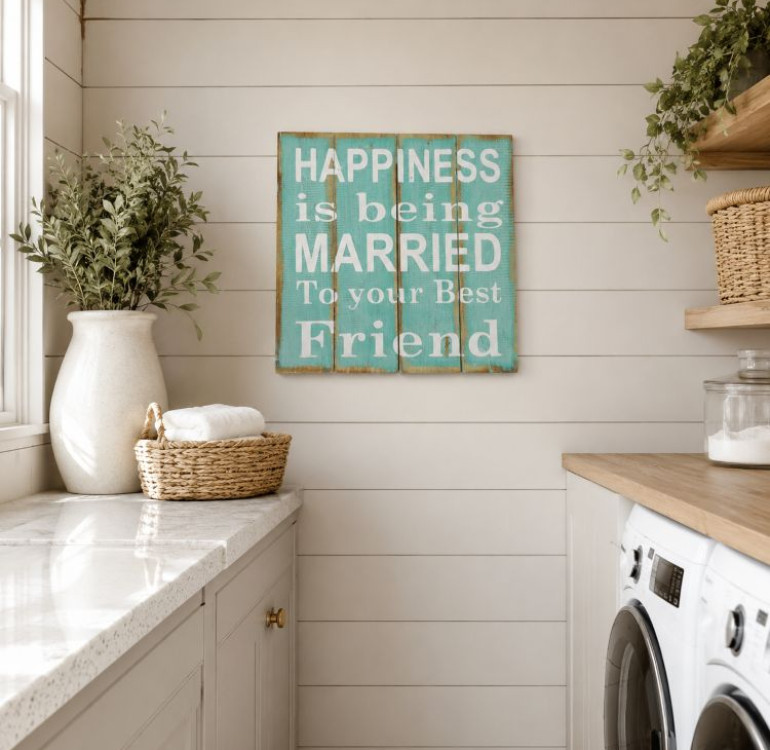 hanging painted sign on wood with words Happiness is being married to your best friend