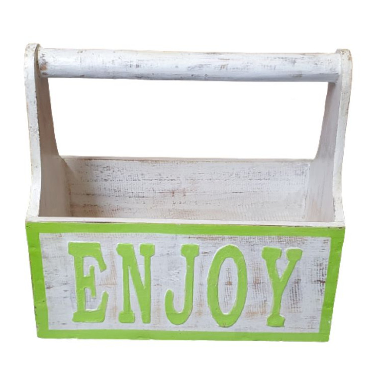 a white painted wooden crate with handle with green wording on the side saying Enjoy