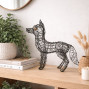 A silver meshed wire fox statue with bushy tail standing proud for your garden