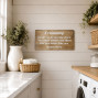 a hanging wooden background sign with hanging string and a friendship message on the front
