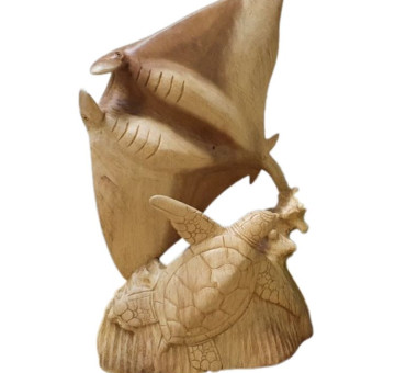 a wooden hand carved from suar wood sting ray and turtle