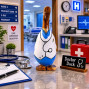 an image of a handcarved and hand painted bamboo duck with the character painted on doctor, nurse