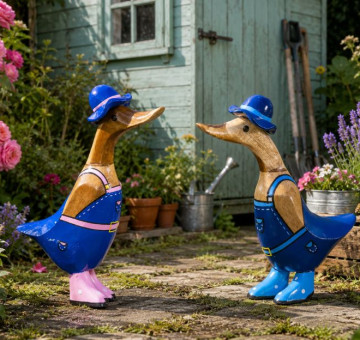 an image of 2 bamboo hand carved ducks