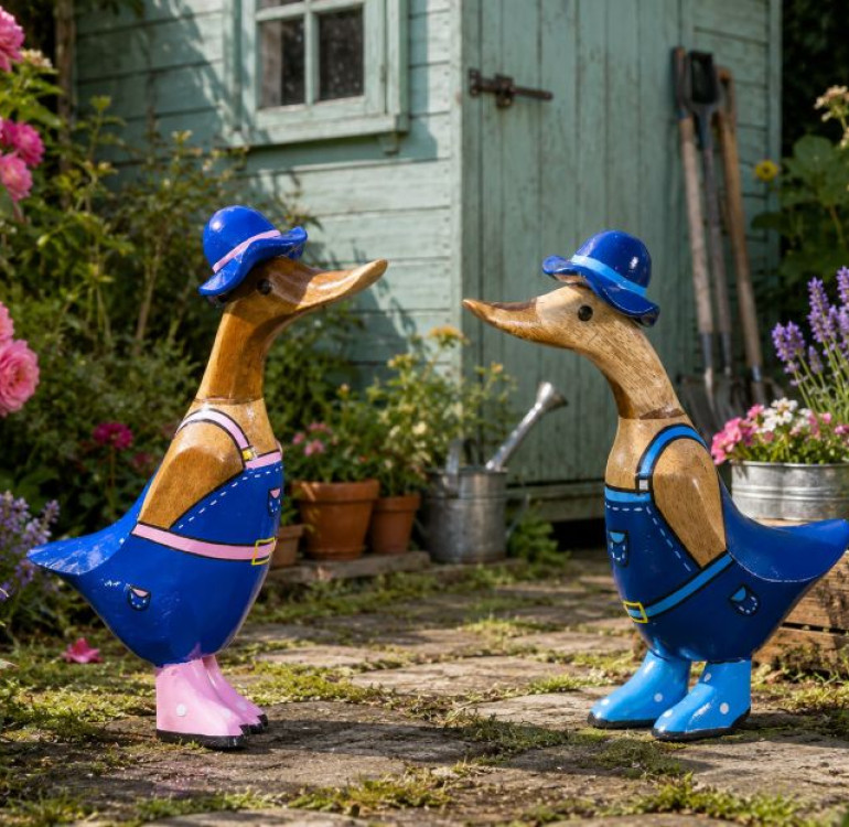 an image of 2 bamboo hand carved ducks