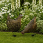 An image of a pair of hand crafted metal chickens for your garden border.