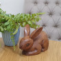 An image of a wooden rabbit ornament