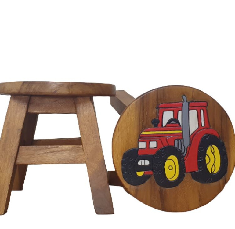 a handmade wooden childrens stool with a red tractor with yellow wheels handpainted on the top