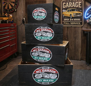 wooden crates with a motorcycle logo on the side, various sizes