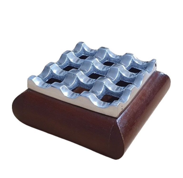 a handmade square and metal topped ashtray