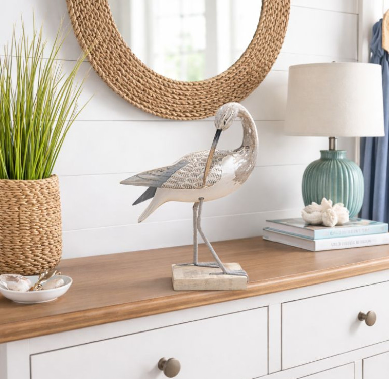 a handmade hand carved sandpiper bird on wood preening ornament