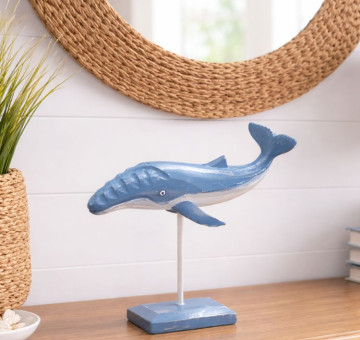a hand carved and hand painted whale