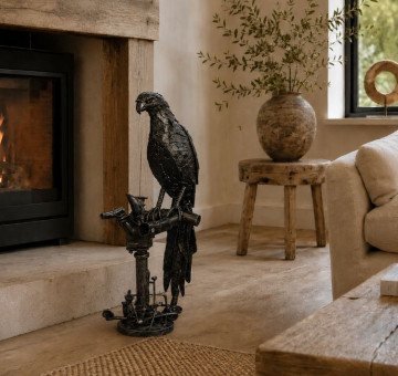 Handcrafted recycled metal parrot on stand sculpture