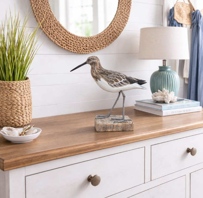 a handmade hand carved sandpiper bird on wood preening ornament
