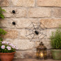 Metal spider on web decoration