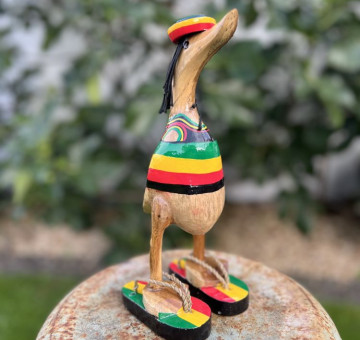 Handmade Bamboo Duck – Rastafarian Style Bring good vibes and island flair to your space with this one-of-a-kind handmade bamboo duck, styled in vibrant Rastafarian colors. Each duck is hand-carved from sustainable bamboo and painted with the iconic red, yellow, green, and black hues inspired by reggae culture. With its laid-back charm and eco-friendly roots, this quirky piece adds a splash of personality to any home, garden, or gift collection. A perfect conversation starter and a unique tribute to peace, love, and natural living.