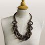 a handmade wooden chain link necklace