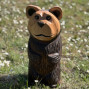 a hand carved outdoor wooden bear sculpture, smiling happy bear