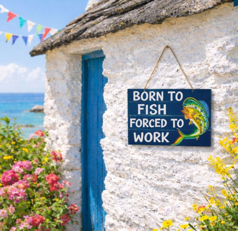 a wooden painted sign for a fisherman. Old Fisherman never die they just smell that way