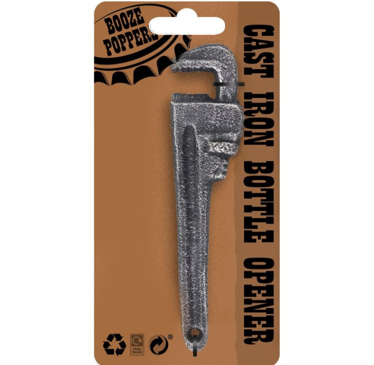 a cast iron bottle opener in the shape of a spanner