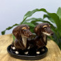 ceramic brown dachshunds salt and pepper novelty handmade shakers on a ceramic tray