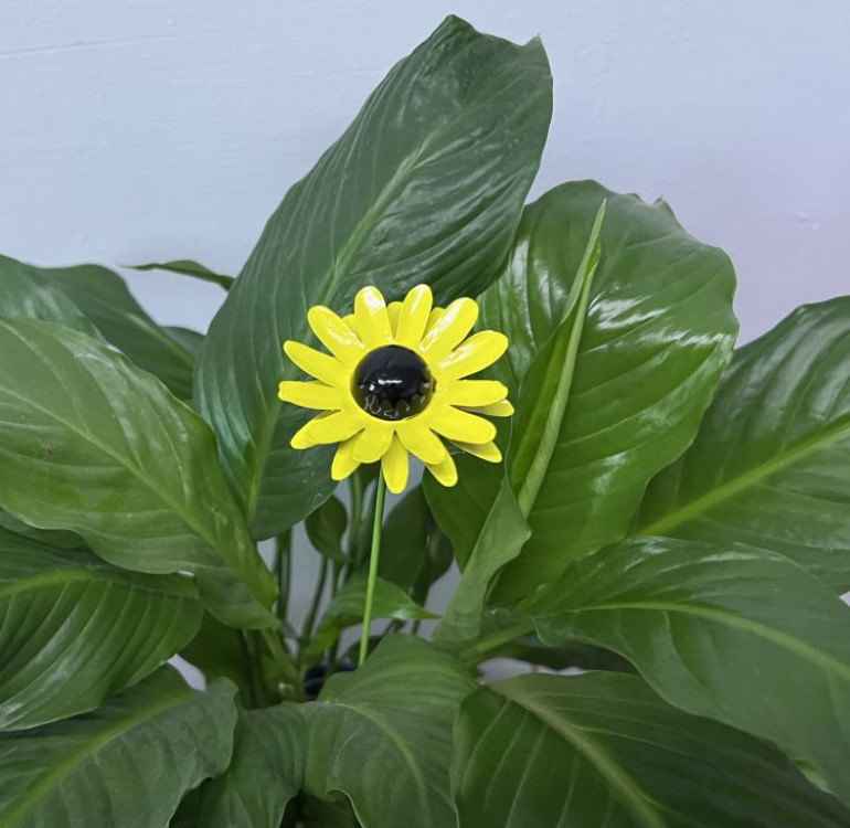 a metal outdoor indoor mini plant stake for your pot in the design of a bright yellow sunflower