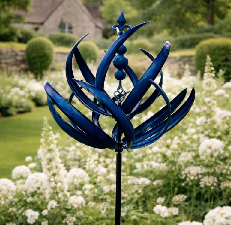 The Stanton Metal Garden Wind Spinner on a stake
