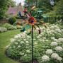 A colourful summery outdoor garden wind spinner on a stake. Vivid Vortex Wind Spinner