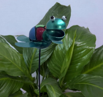 a metal outdoor indoor mini plant stake for your pot in the design of a yellow flower