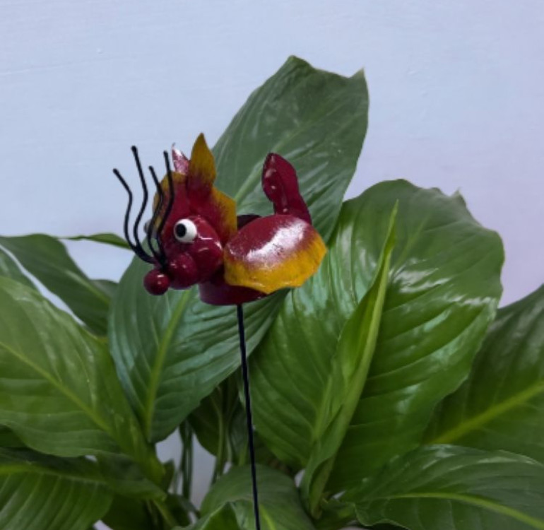 a metal outdoor indoor mini plant stake for your pot in the design of a yellow flower