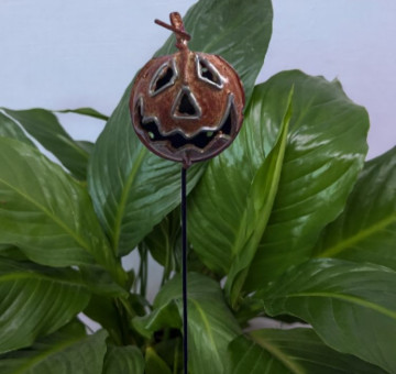 a metal outdoor indoor mini plant stake for your pot in the design of a yellow flower