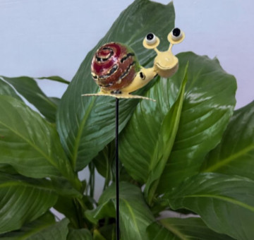 a metal outdoor indoor mini plant stake for your pot in the design of an owl