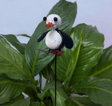 a metal outdoor indoor mini plant stake for your pot in the design of an owl