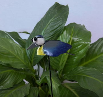 a metal outdoor indoor mini plant stake for your pot in the design of an owl