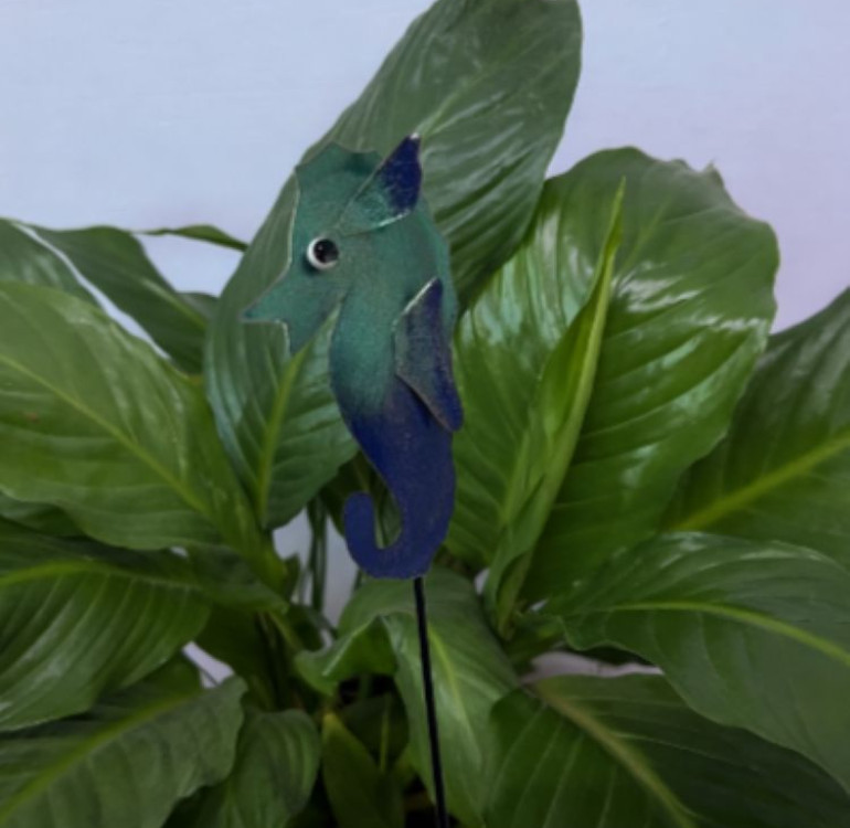 a metal outdoor indoor mini plant stake for your pot in the design of a seahorse