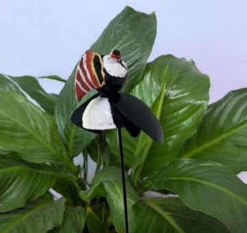 a metal outdoor indoor mini plant stake for your pot in the design of a seahorse