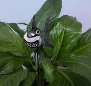 a metal outdoor indoor mini plant stake for your pot in the design of a seahorse