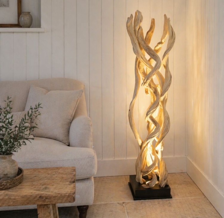 a sculptural eye-catching handcrafted plug in floor lamp made from dangled dried vines
