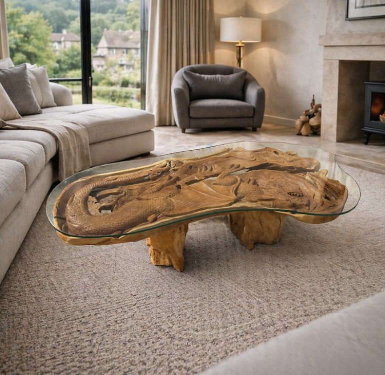 a teak dragon carving coffee table. a whole dragon carved by hand into the top of the coffee table, finished with a piece of glass