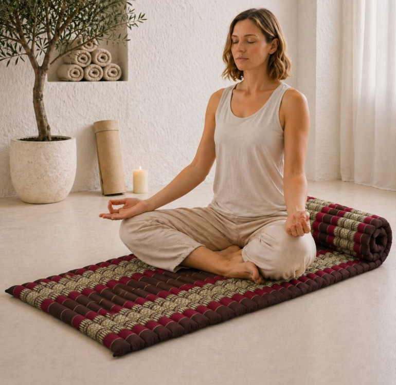 kapok filled rollable mattress in a red and burg pattern design