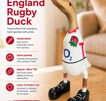 an image of a handcarved and hand painted bamboo duck with the character of an english rugby player