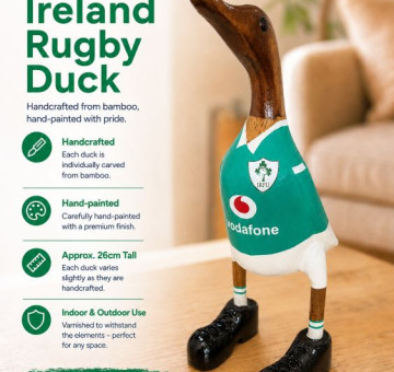 an image of a handcarved and hand painted bamboo duck with the character of a Irish rugby player