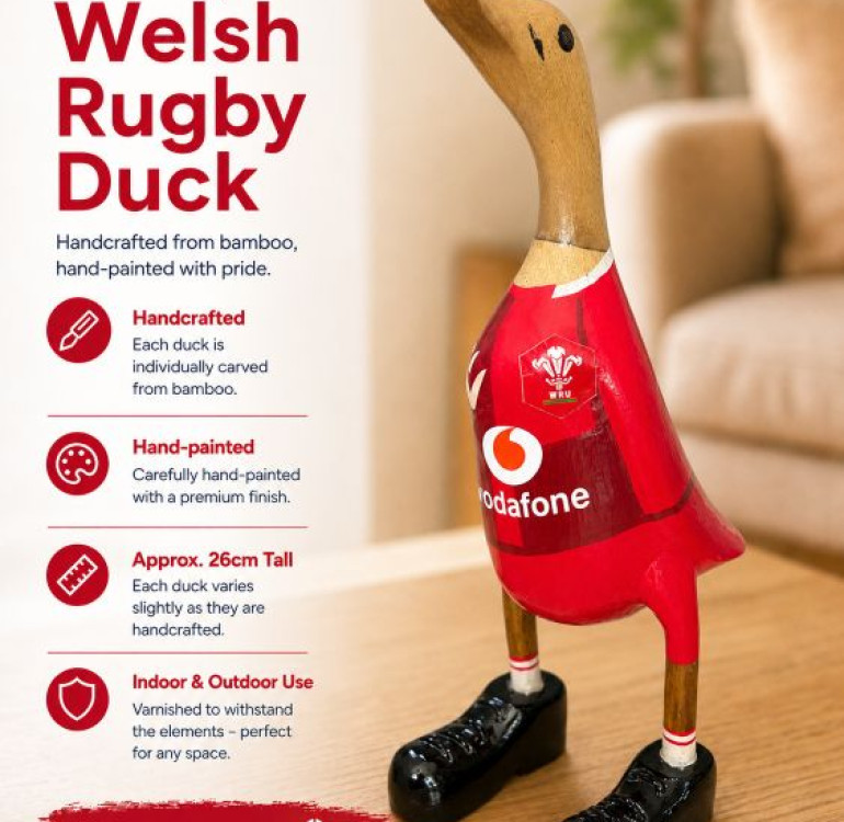 an image of a handcarved and hand painted bamboo duck with the character of a welsh rugby player